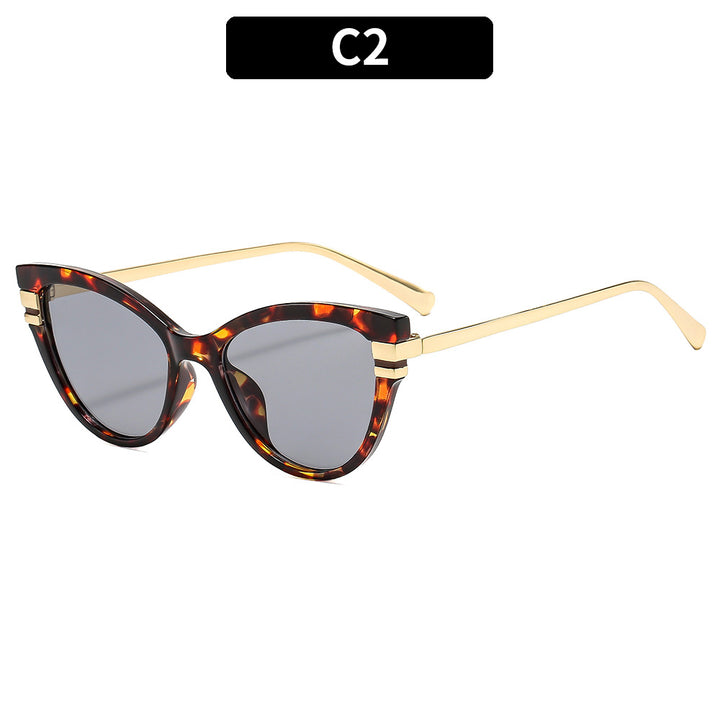 Stylish Cat-Eye Sunglasses with Decorative Gold Accents
