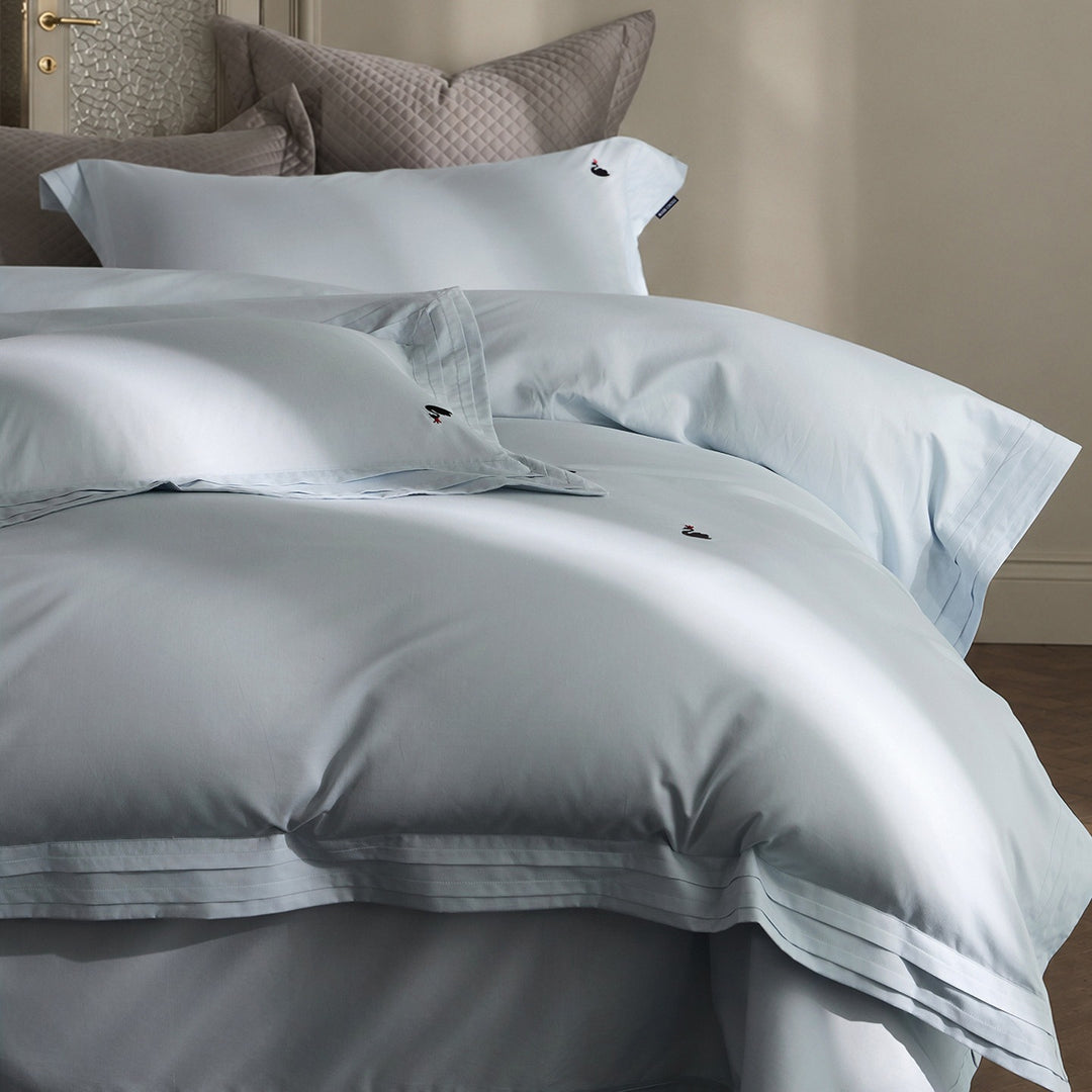 Fine-made duvet cover set made of Mako cotton with subtle monogram embroidery & pleated border