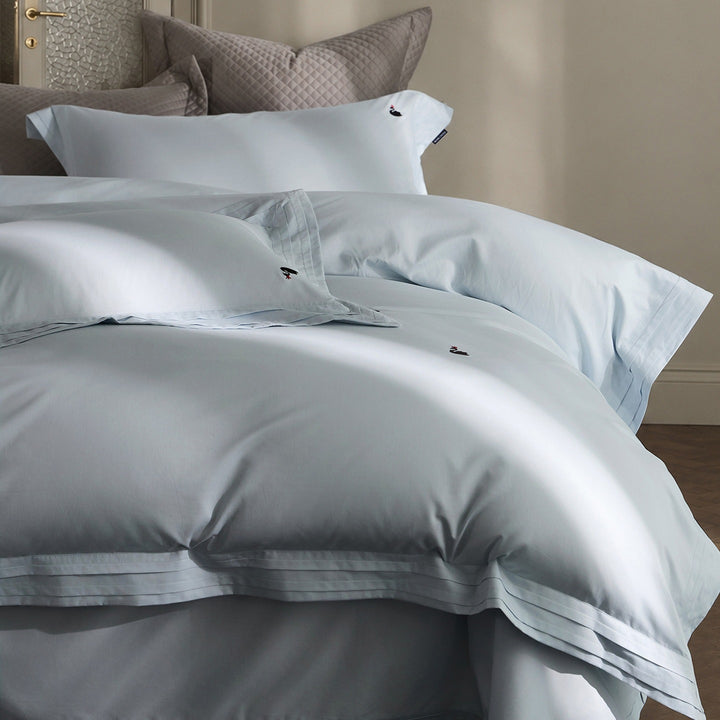 Fine-made duvet cover set made of Mako cotton with subtle monogram embroidery & pleated border