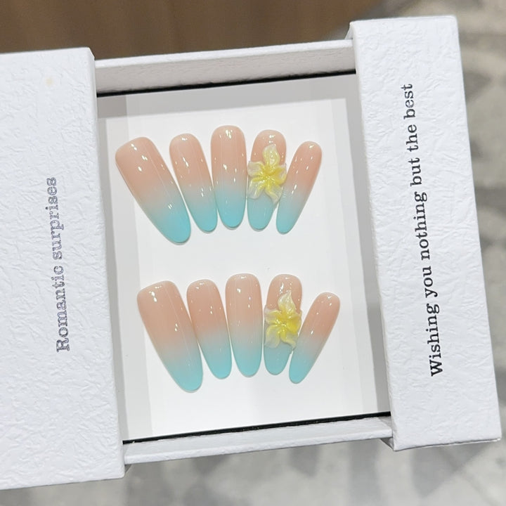 Artificial nails with enchanting ombre effect and floral accents Kalsten