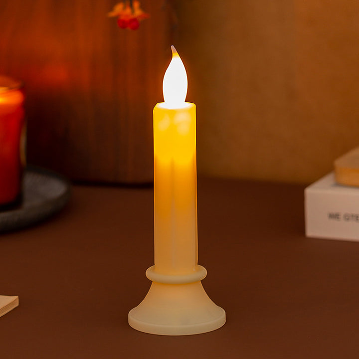 Flickering LED pillar candle in real wax look with removable holder