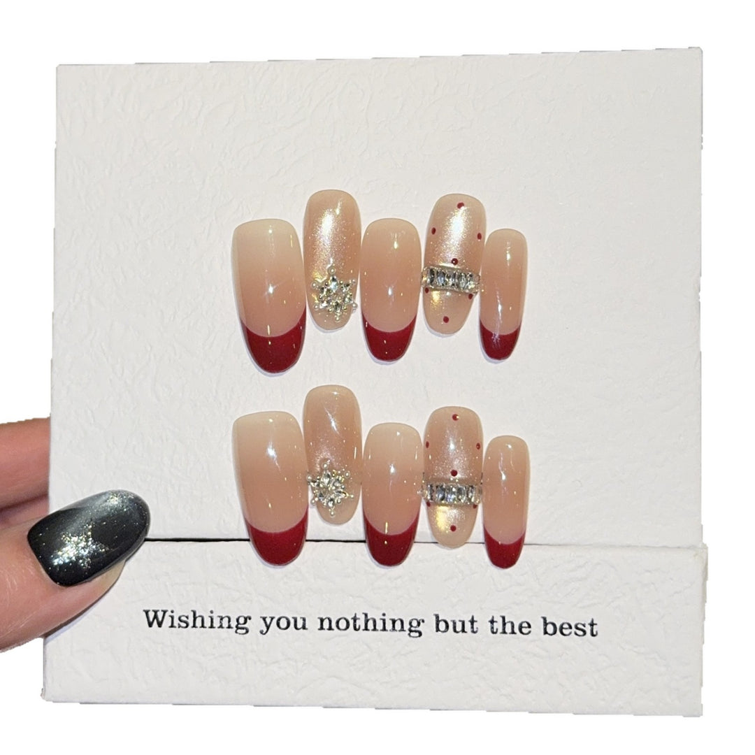 Artificial nails with festive design and rhinestone details Kalsten