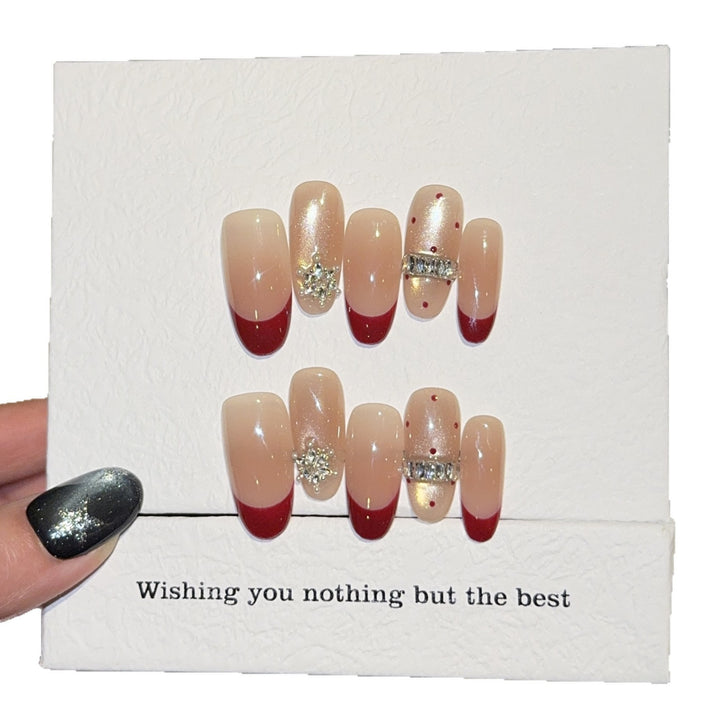 Artificial nails with festive design and rhinestone details Kalsten
