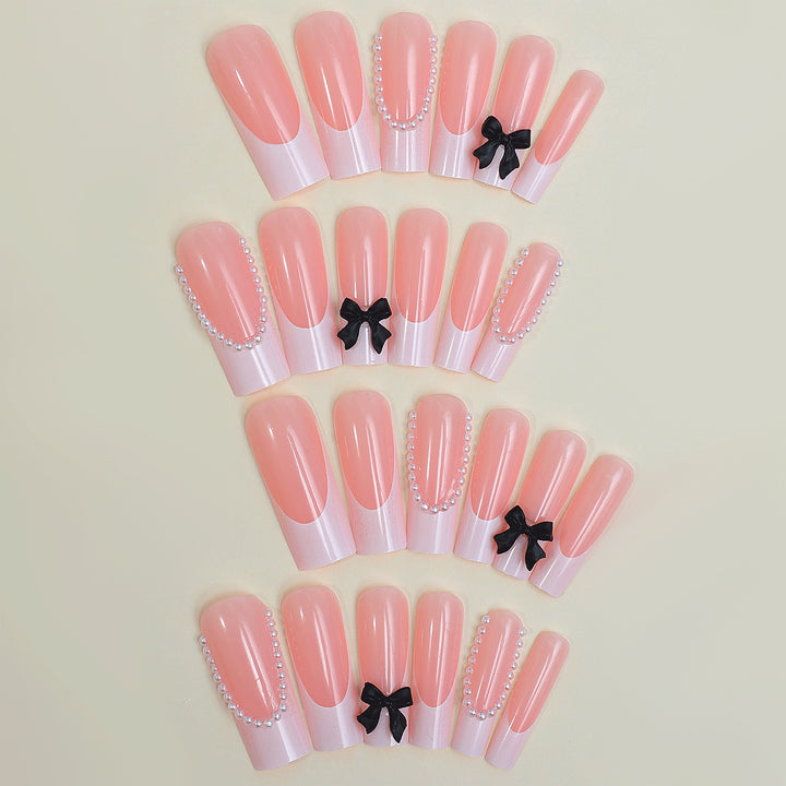 Artificial nail set with elegant rhinestone and bow decorations Kalsten