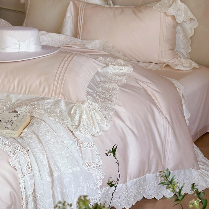 Fine cotton satin bed set with lace, ruffles and decorative stitching