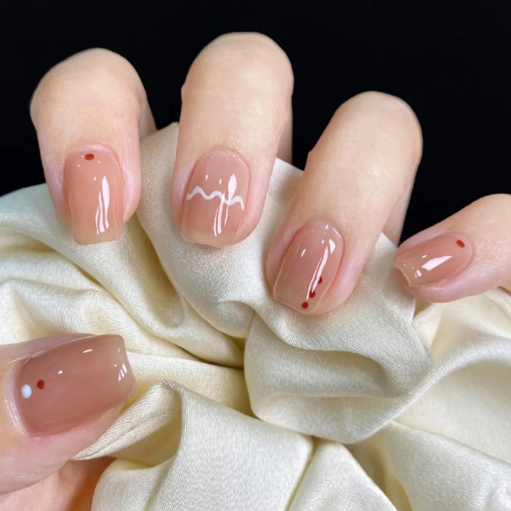 Glamorous artificial nails with delicate flower and glitter effects Kalsten
