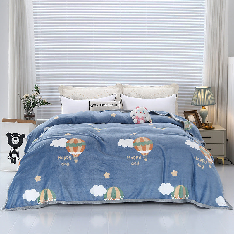 Women's cozy fleece blanket with playful cloud pattern Kalsten