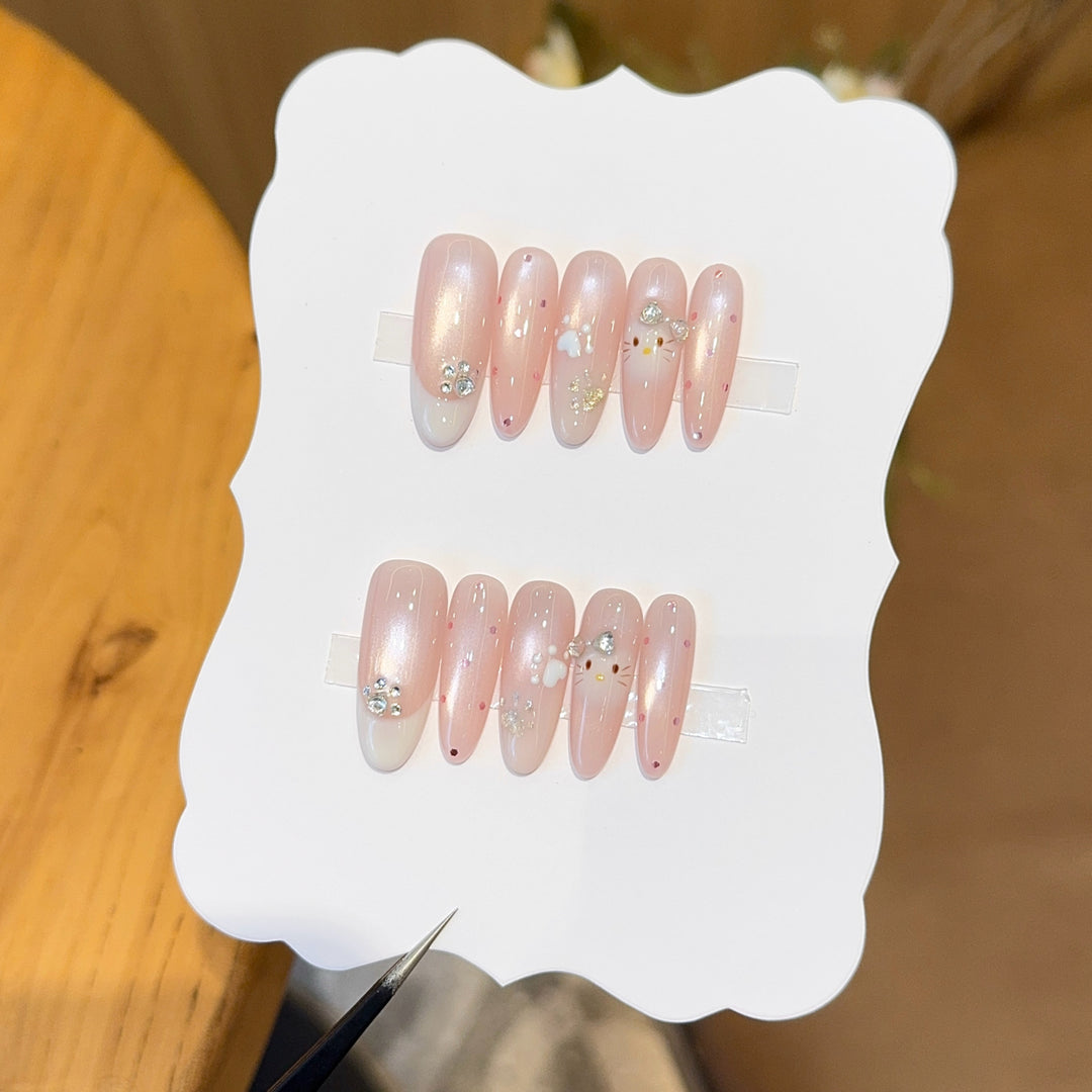 Artificial nail tips with playful penguin and paw print design Kalsten