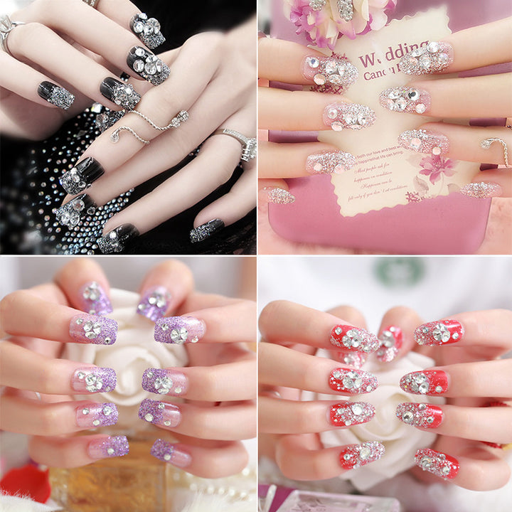 Artificials nails with sparkling rhinestone accents and elegant flower embellishments Kalsten