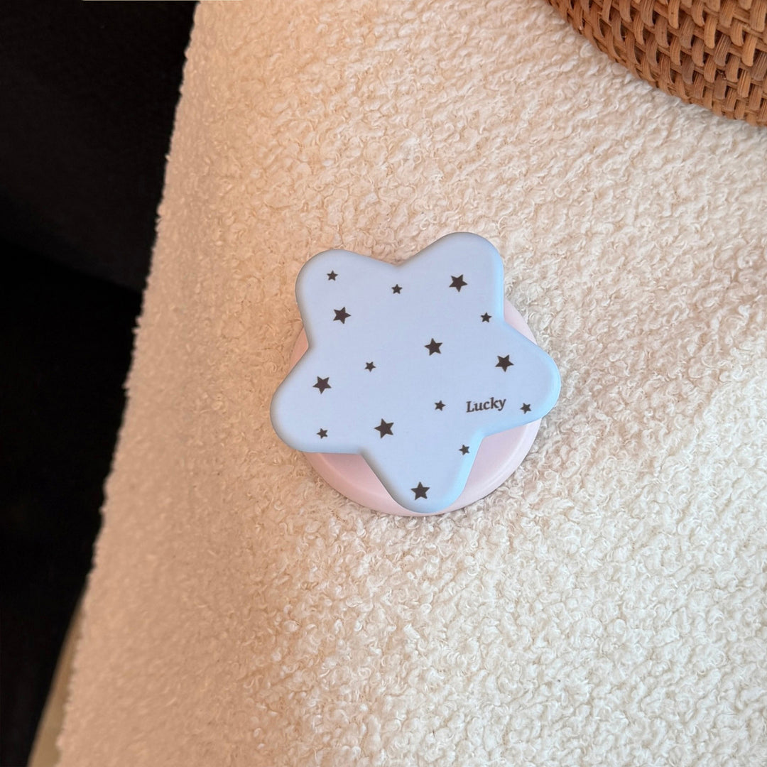 Playful smartphone holder in star design Kalsten