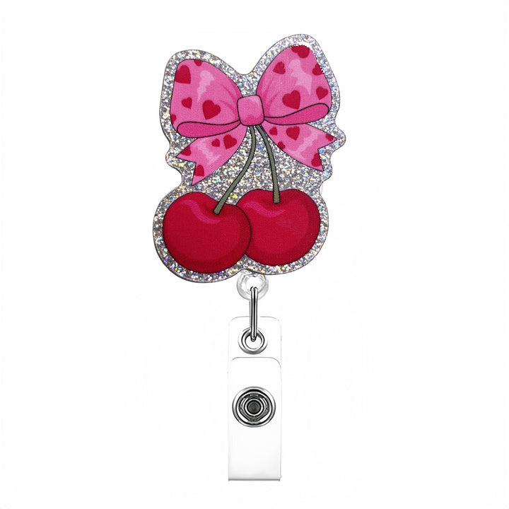 Expandable badge holder with anatomical heart pendant