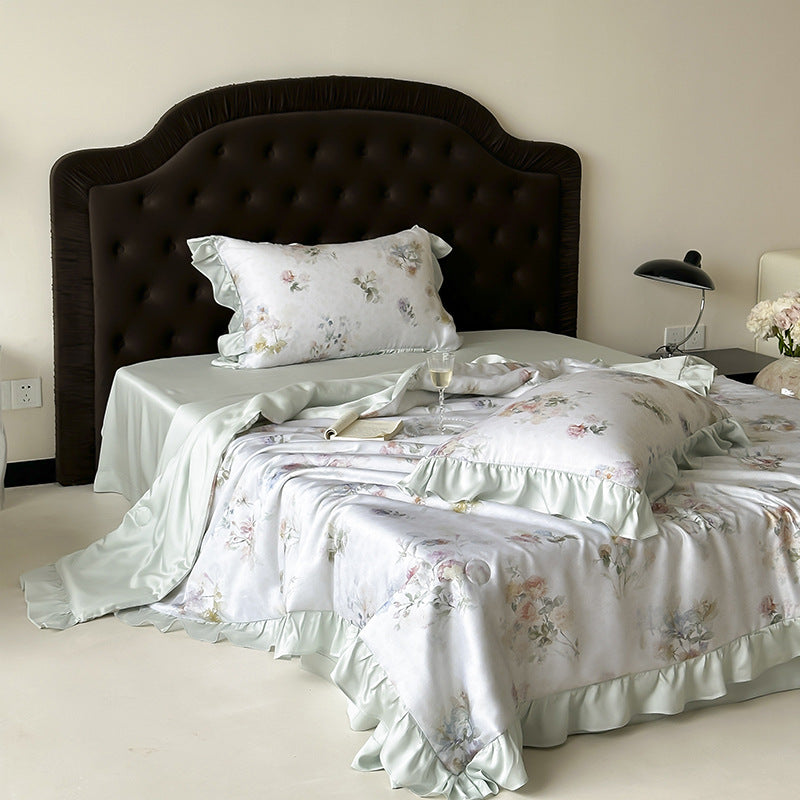 Satin sleep set with silky finish, watercolor flower motif and ruffle edges