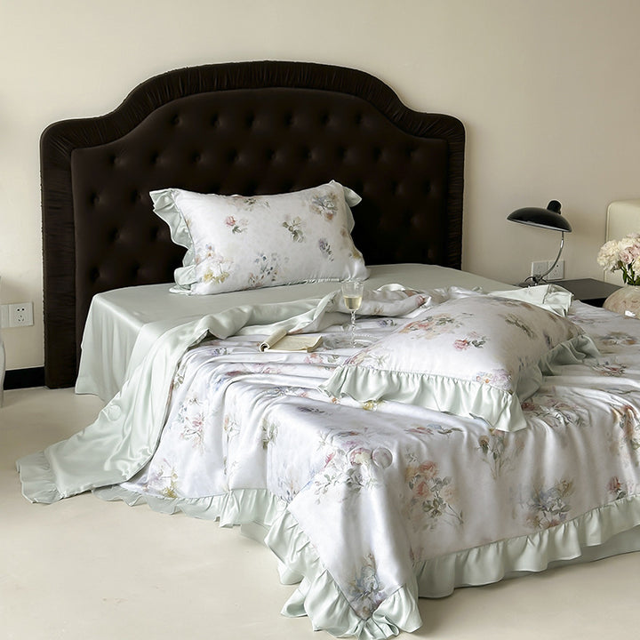 Satin sleep set with silky finish, watercolor flower motif and ruffle edges