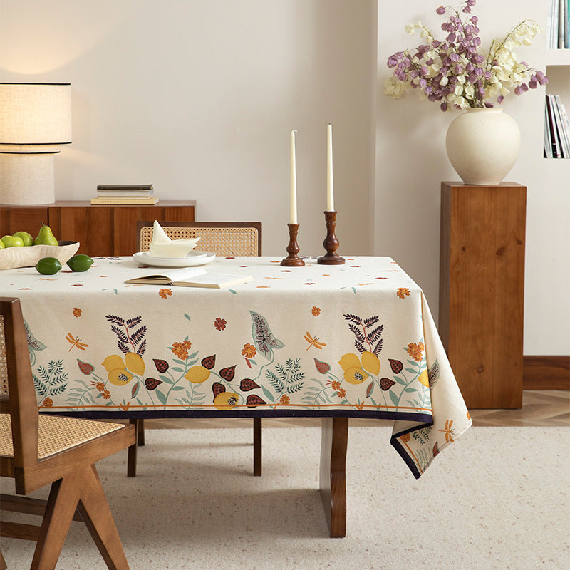 Tablecloth made of cotton blend with floral border illustration and reinforced hem Kalsten