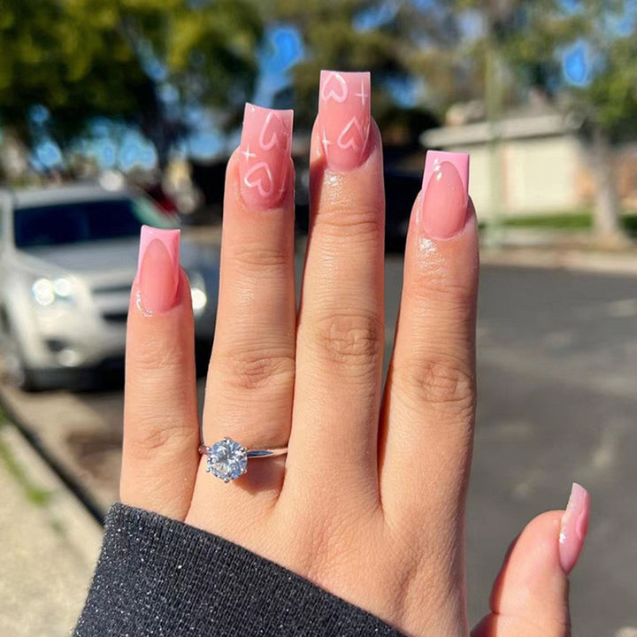 Artistic acrylic nails with heart design Kalsten
