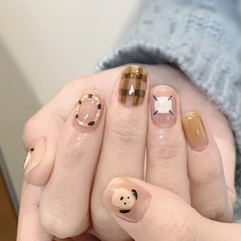 Playful artificial nails with cute animal and pattern accents Kalsten