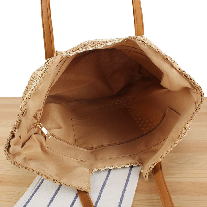 Shopping bag made of woven natural material with elegant leather handles Kalsten
