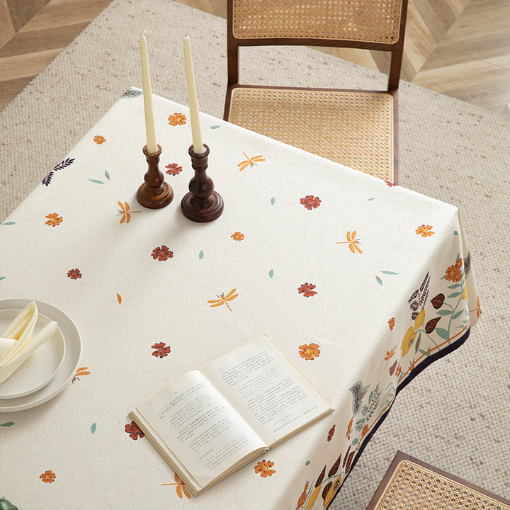 Tablecloth made of cotton blend with floral border illustration and reinforced hem Kalsten