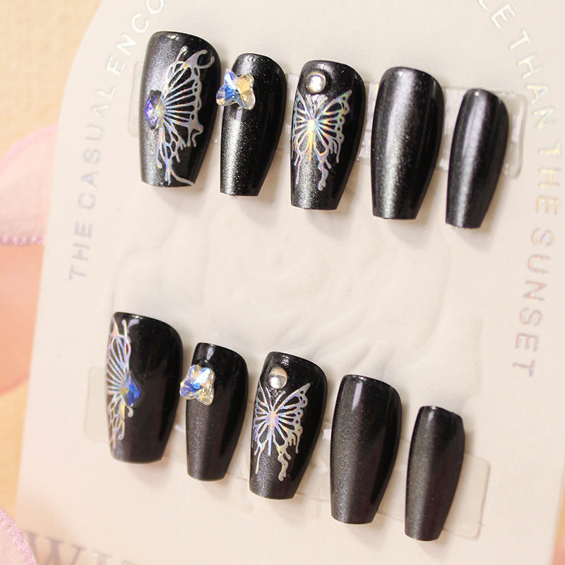 Artificial nails with decorative butterfly designs and glitter accents Kalsten