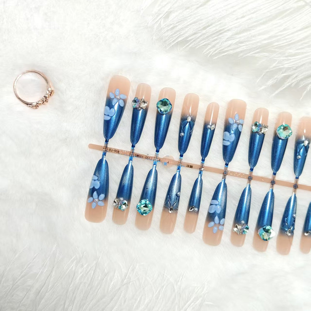 Elegant artificial nails with floral applications and glitter elements Kalsten