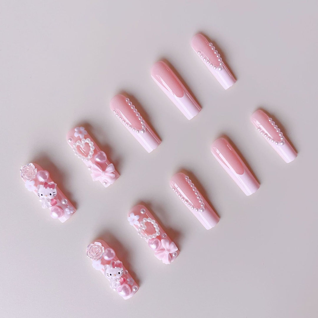 Acrylic nail set with playful 3D accents and pearl details Kalsten