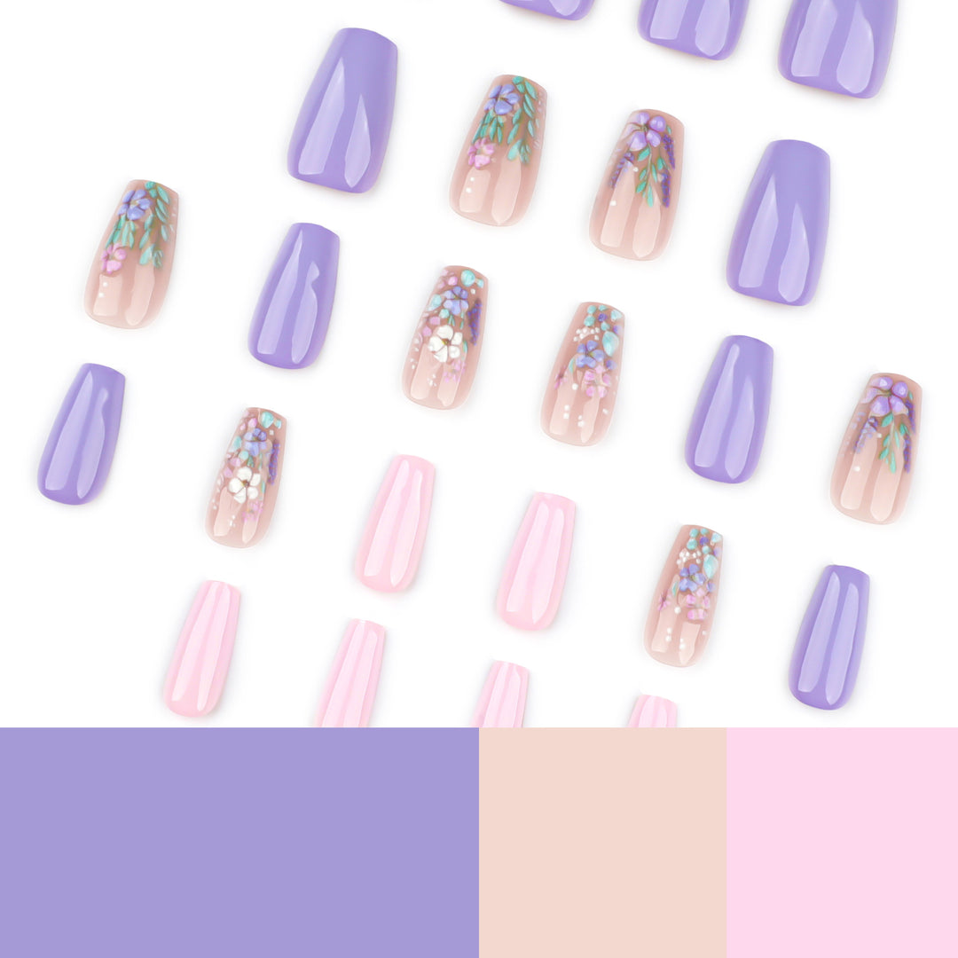 Elegant artificial nail art with delicate flower motifs Kalsten