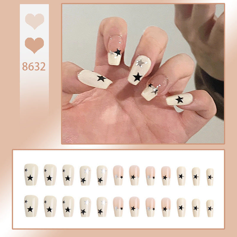 Artificial nail set with glamorous star design and sparkling accents Kalsten