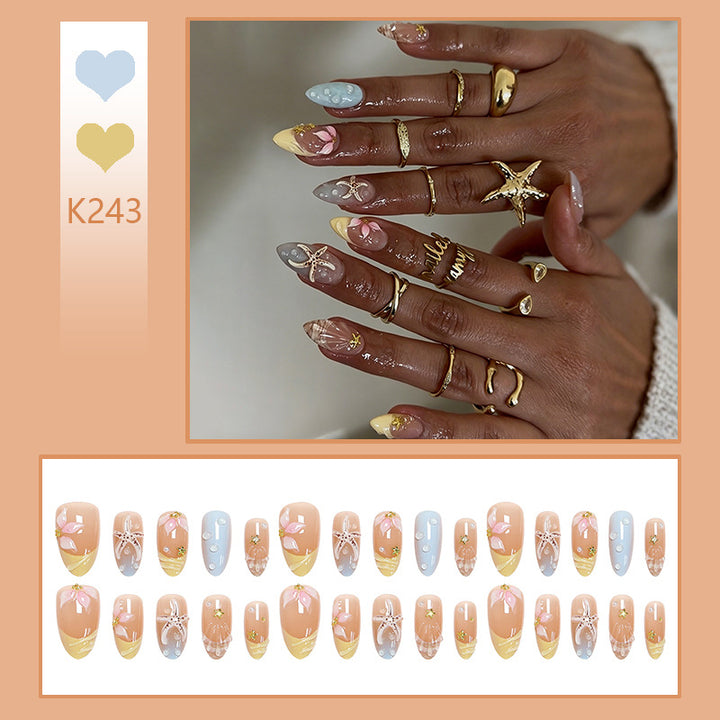 Artificial nail set with floral motifs and glitter accents Kalsten