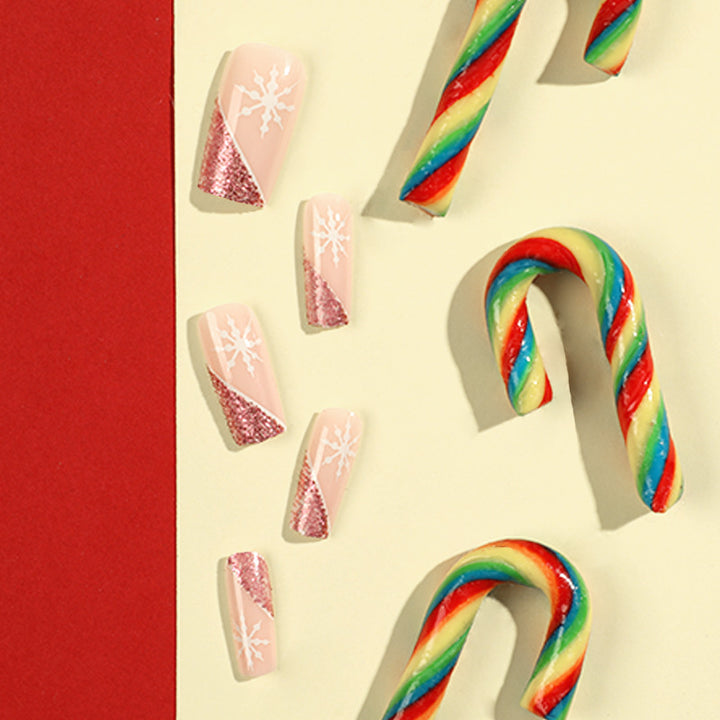Artful Nail Extensions with Festive Glitter and Snowflake Design Kalsten