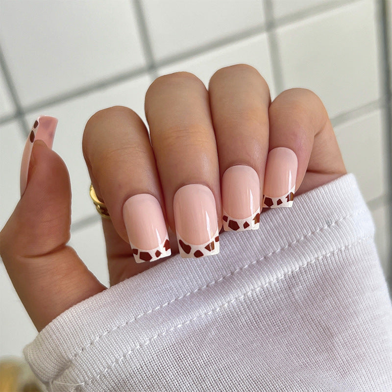 Artful nail extensions with an elegant leaf pattern Kalsten