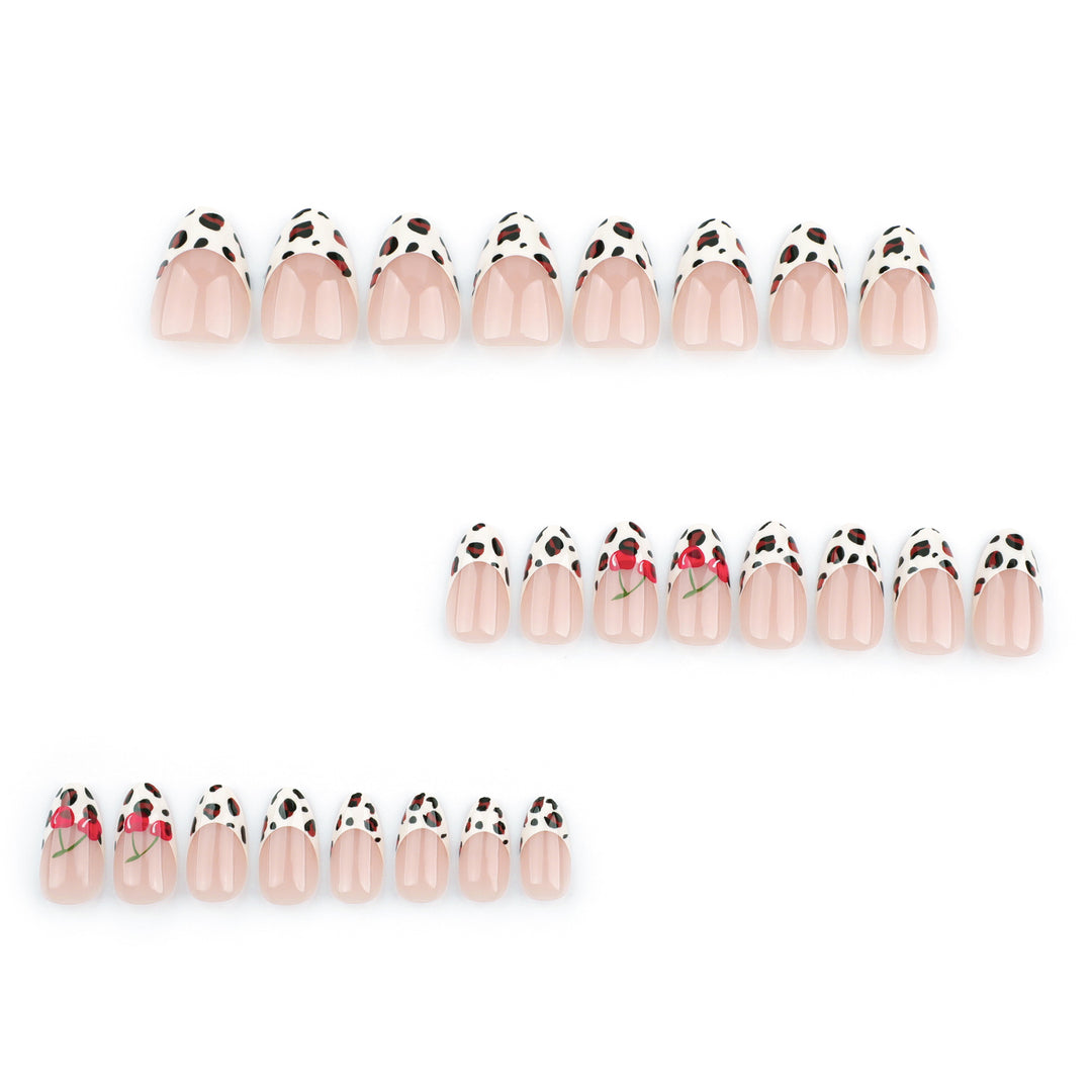 Artful animal pattern nails with cherry accents Kalsten