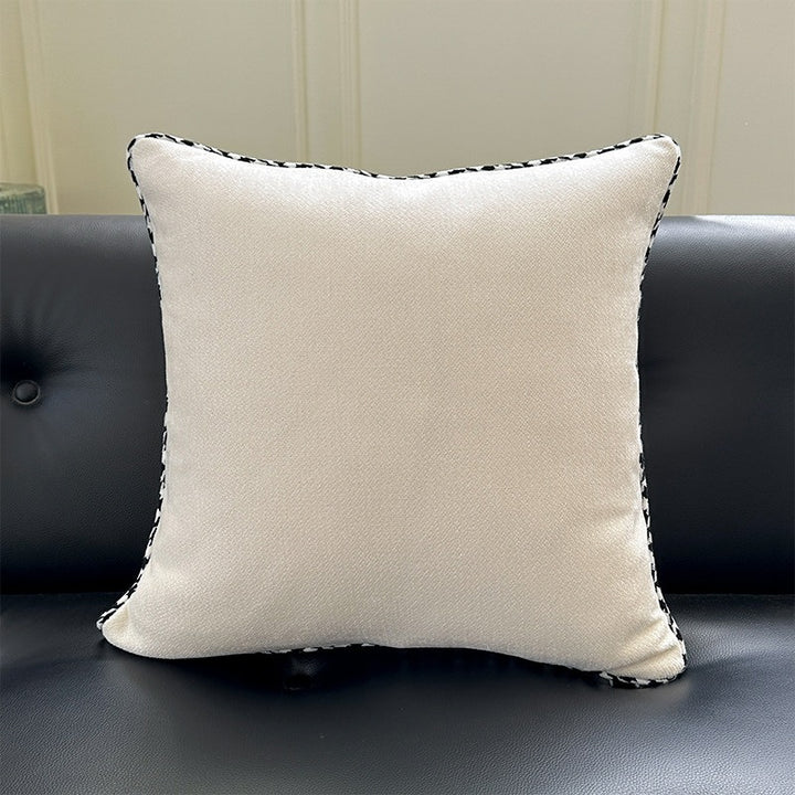 Decorative square decorative pillow made of soft velvet with contrasting piping
