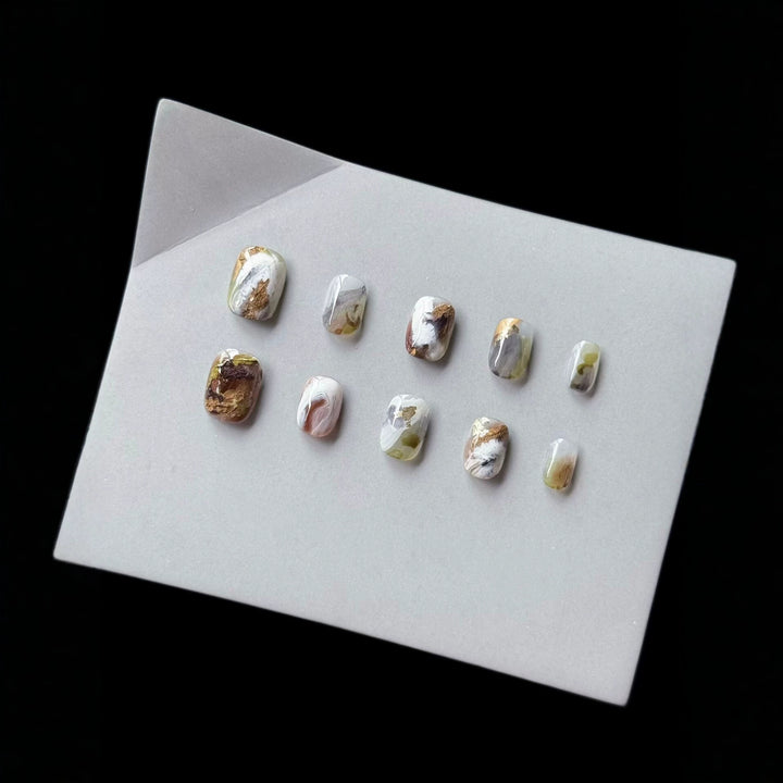 Artistic Press-On Nail Art Set with Marble and Gold Accents