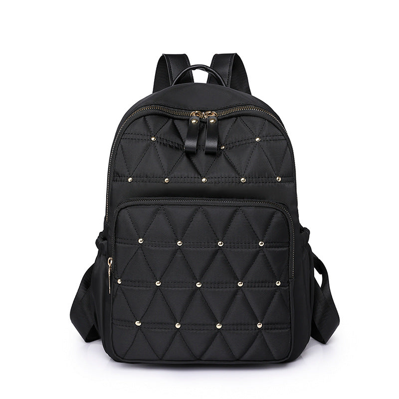 Stylish Quilted Backpack with Gold Accents