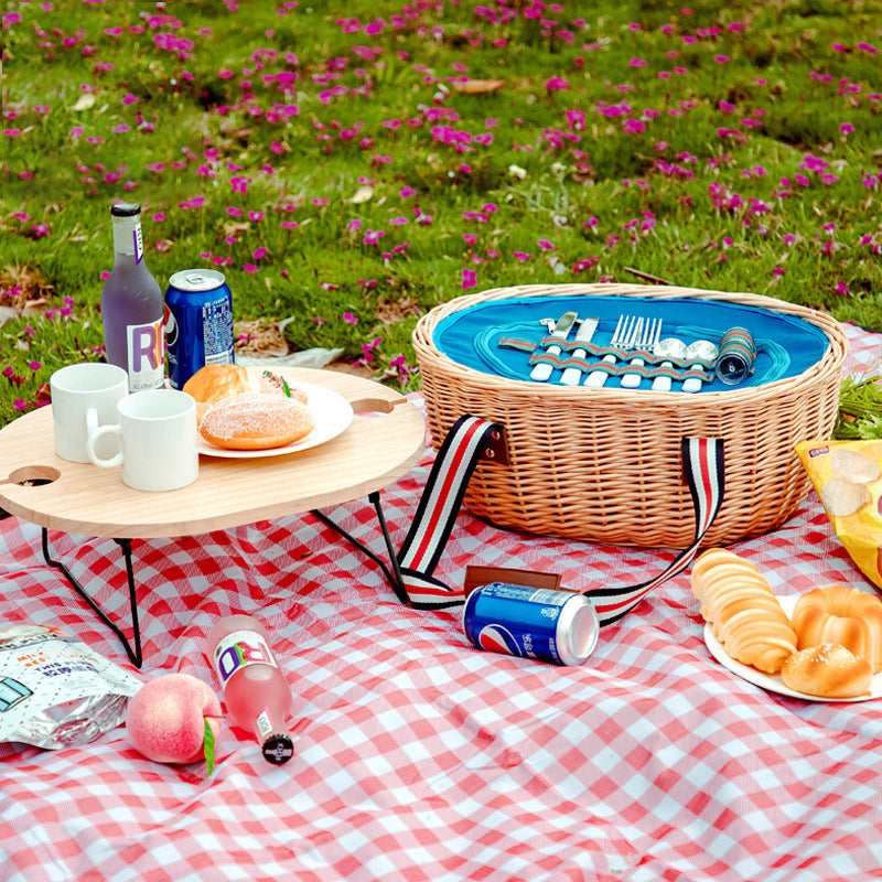 Exclusive basket with handles made of woven rattan Kalsten