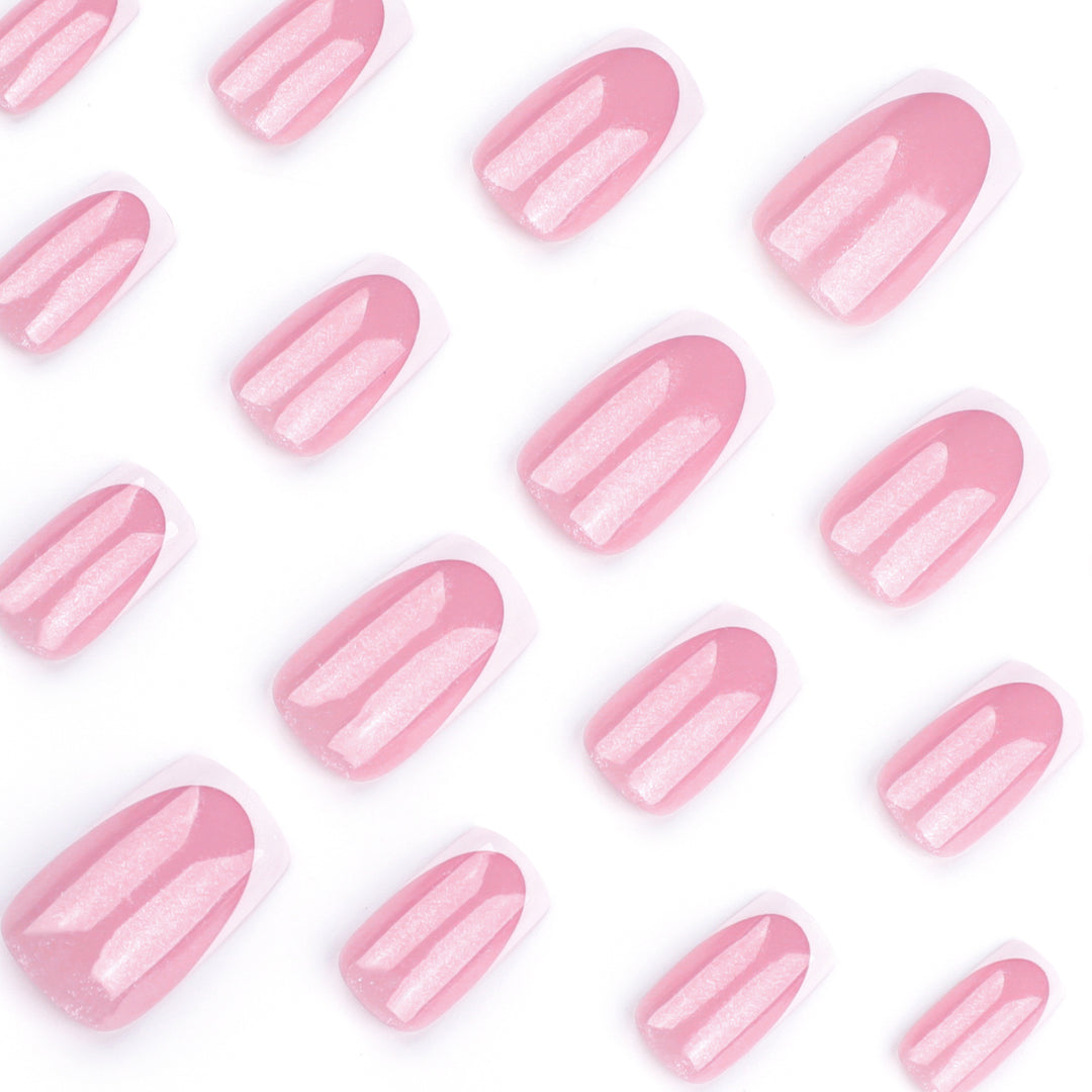 Sparkling nail art with elegant French tip design Kalsten