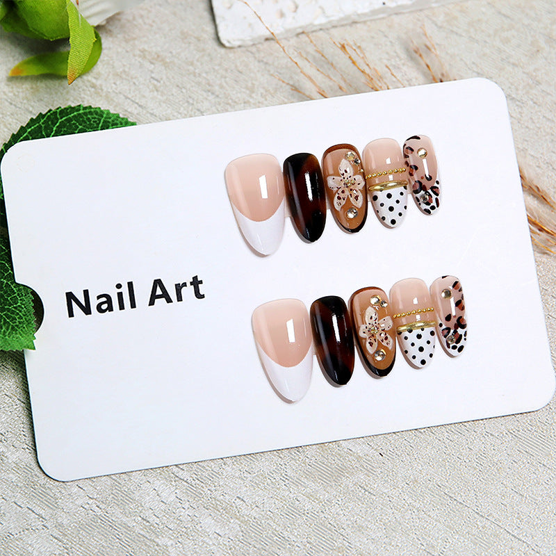 Exquisite nail art with elegant embellishments Kalsten