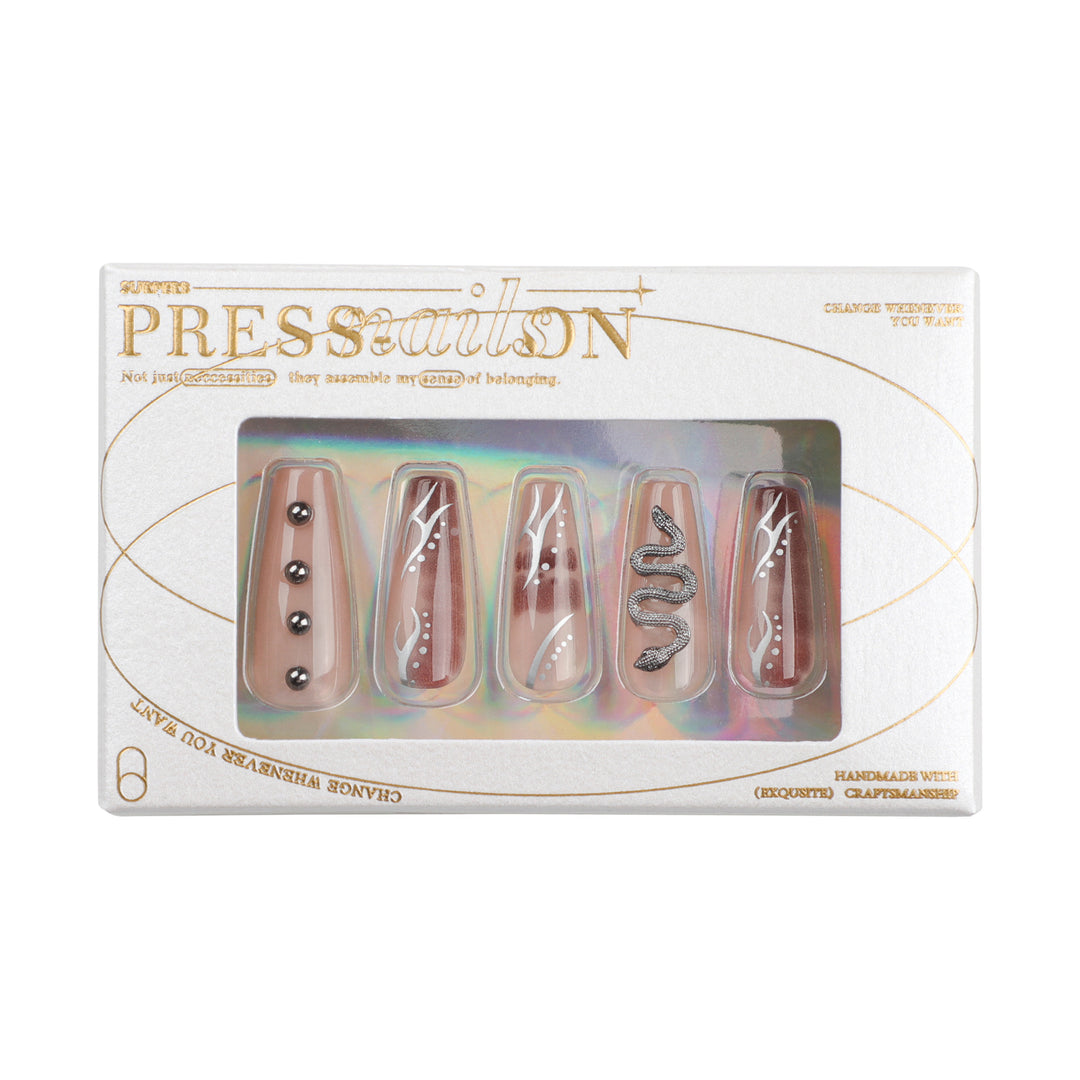 Artistic fingernails with snake and glitter accents Kalsten