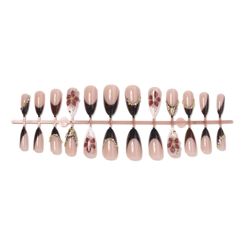 Acrylic nail set with elegant flower and glitter accent Kalsten