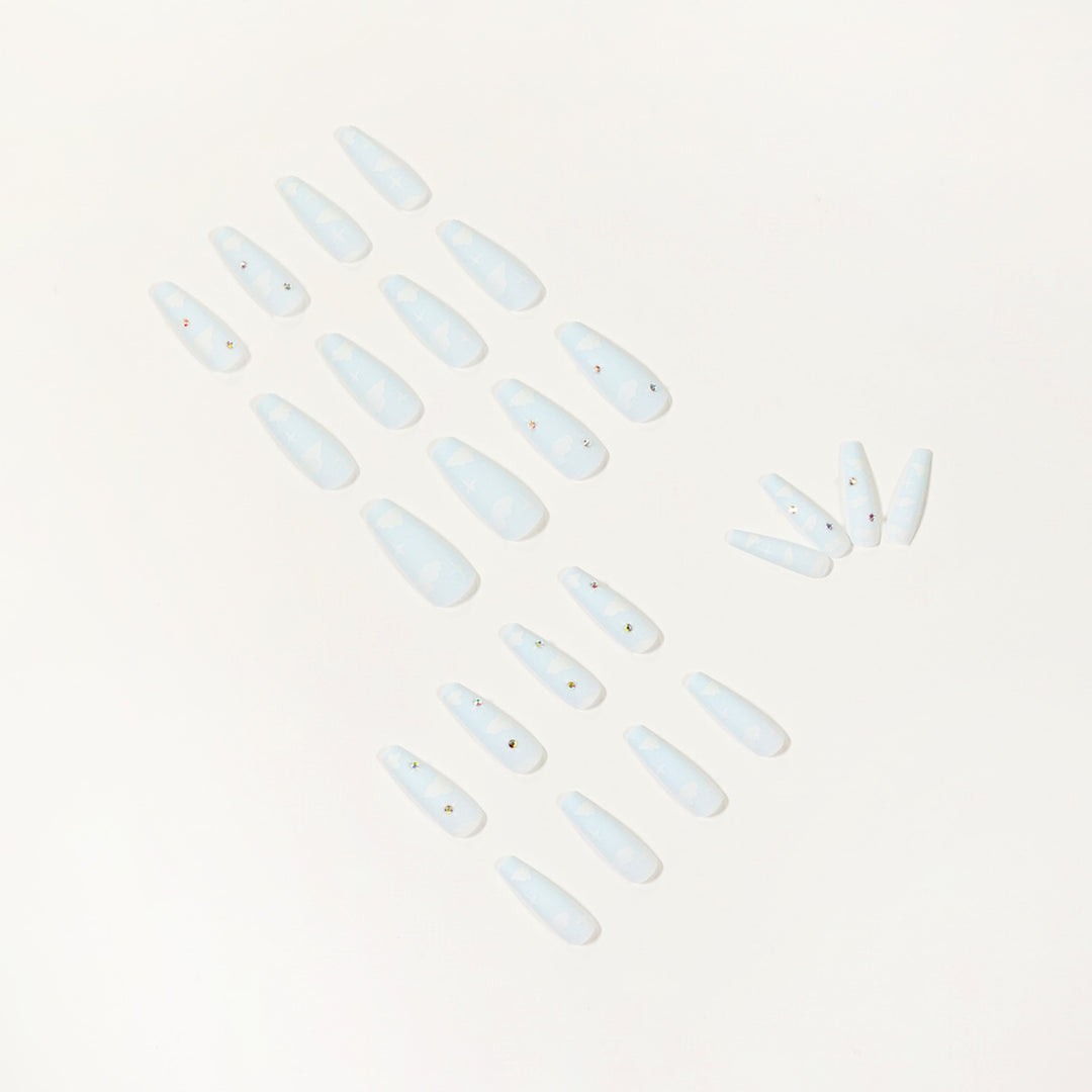Creative nail art in cloud design with glitter accents Kalsten