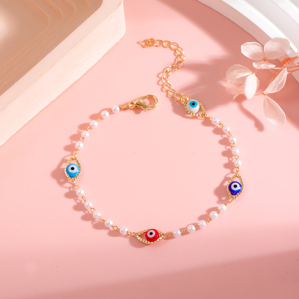 Elegant Pearl and Eye Charm Necklace Kalsten