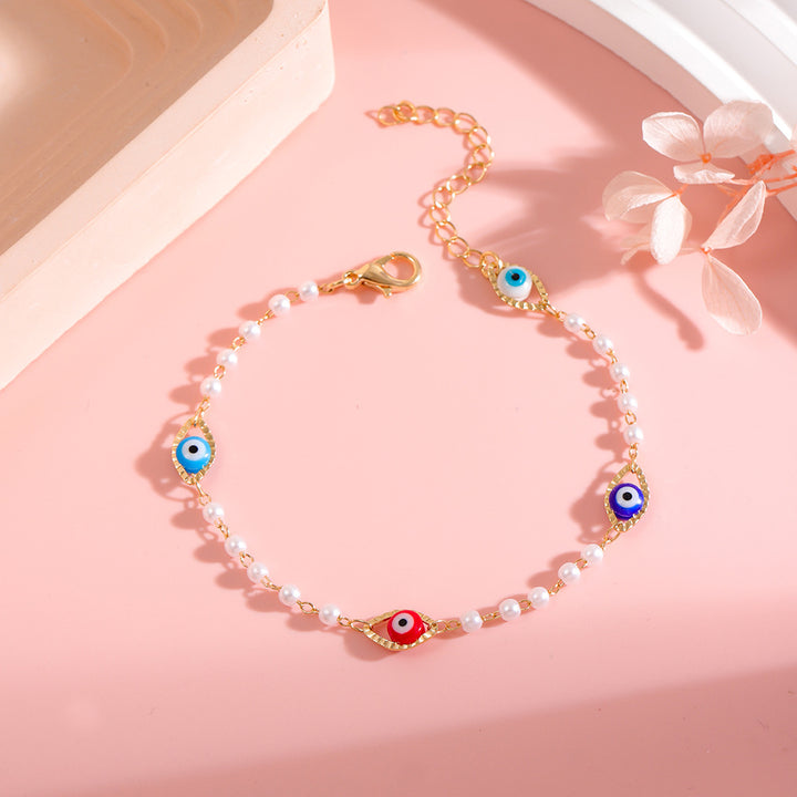 Elegant Pearl and Eye Charm Necklace Kalsten