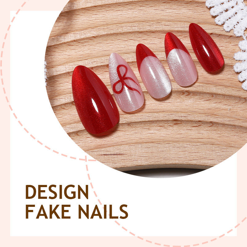 Artificial nail set with elegant red and delicate bow accents Kalsten