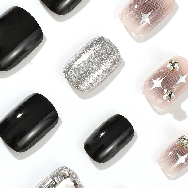 Elegant Nail Art with Glitter and Star Motifs Kalsten