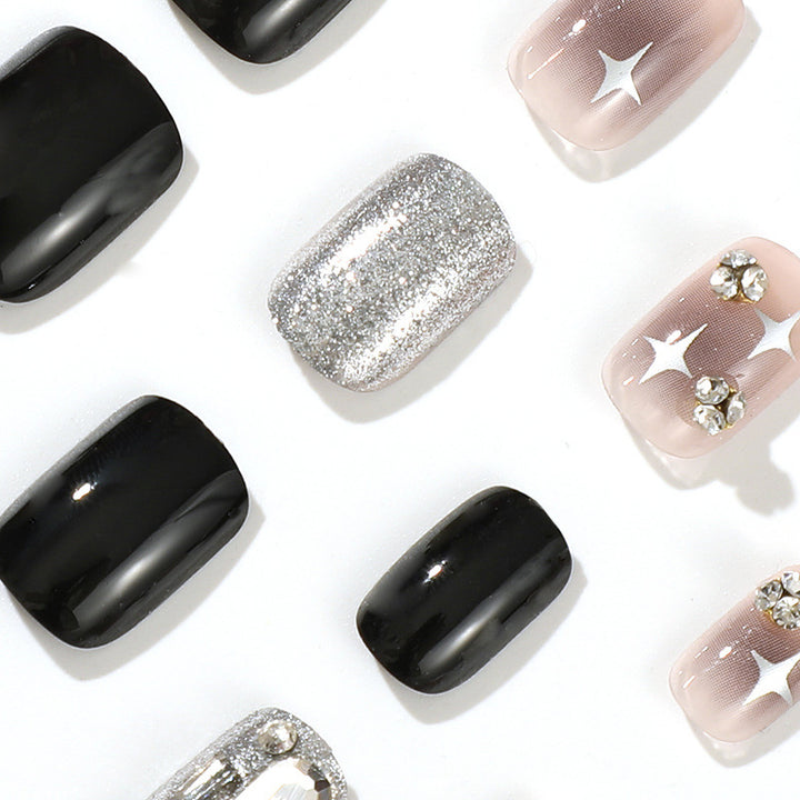 Elegant Nail Art with Glitter and Star Motifs Kalsten