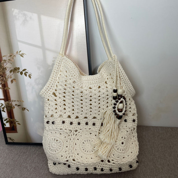 Hand-crocheted shoulder bag with unique fringe design Kalsten