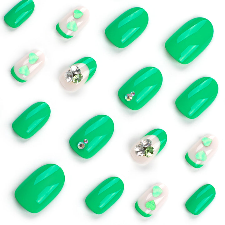 Artistic Nail Extensions with Lovable Heart Patterns and Glitter Accents Kalsten