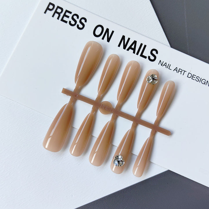Acrylic nails with glamorous stone accents Kalsten