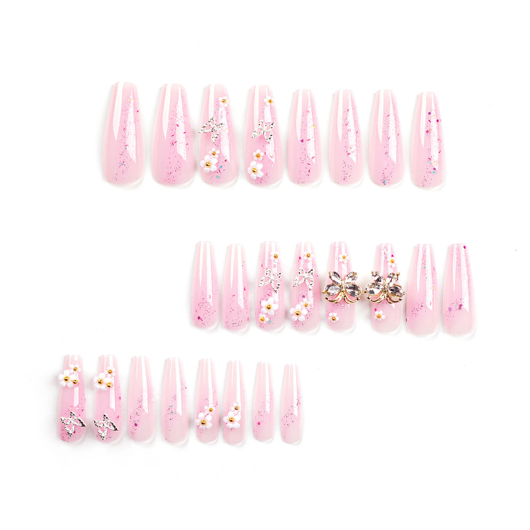 Artistic Nail Extensions with Glitter and Floral Accents Kalsten