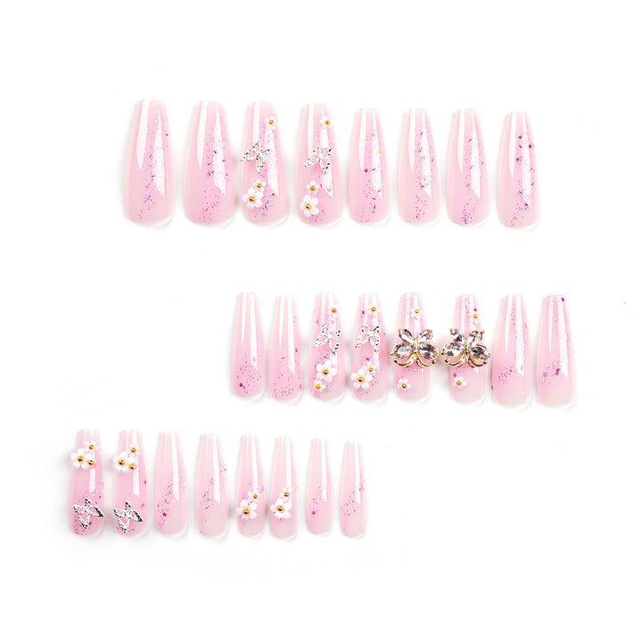 Artistic Nail Extensions with Glitter and Floral Accents Kalsten